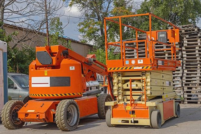 warehouse forklift in action with neatly arranged pallets in Berlin, GA